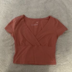 Orange v shaped crop top